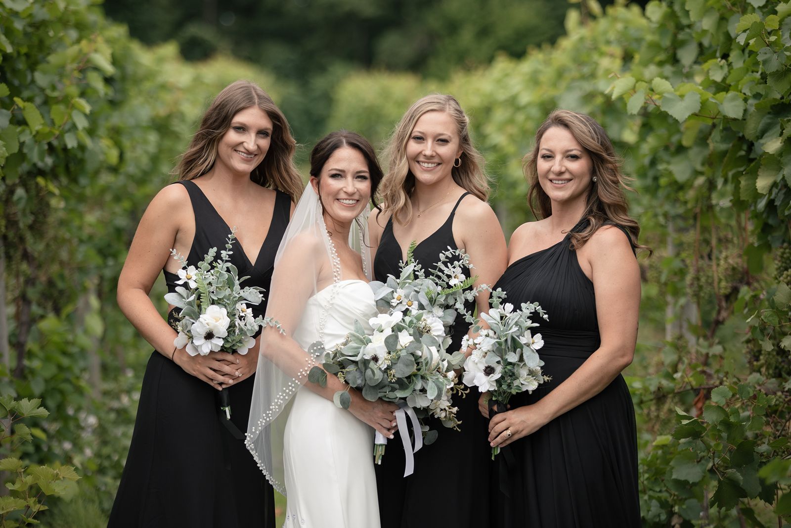 Bride and bridesmaids in tabor hill weddings vineyard