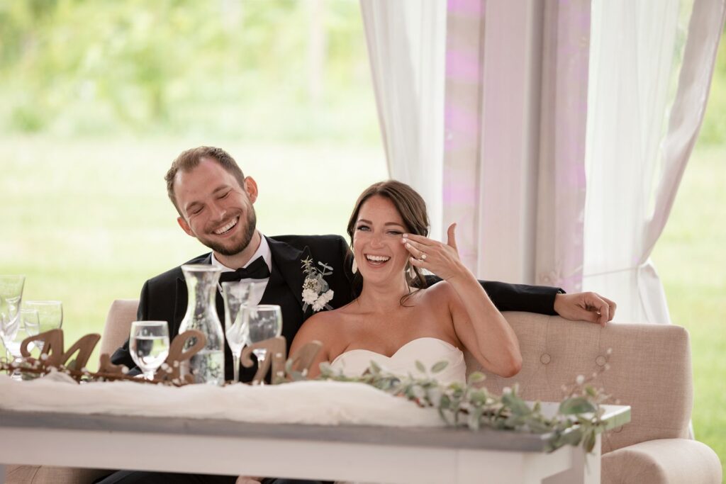 Bride and Groom Crying Laughing at Tabor Hill Weddings Reception