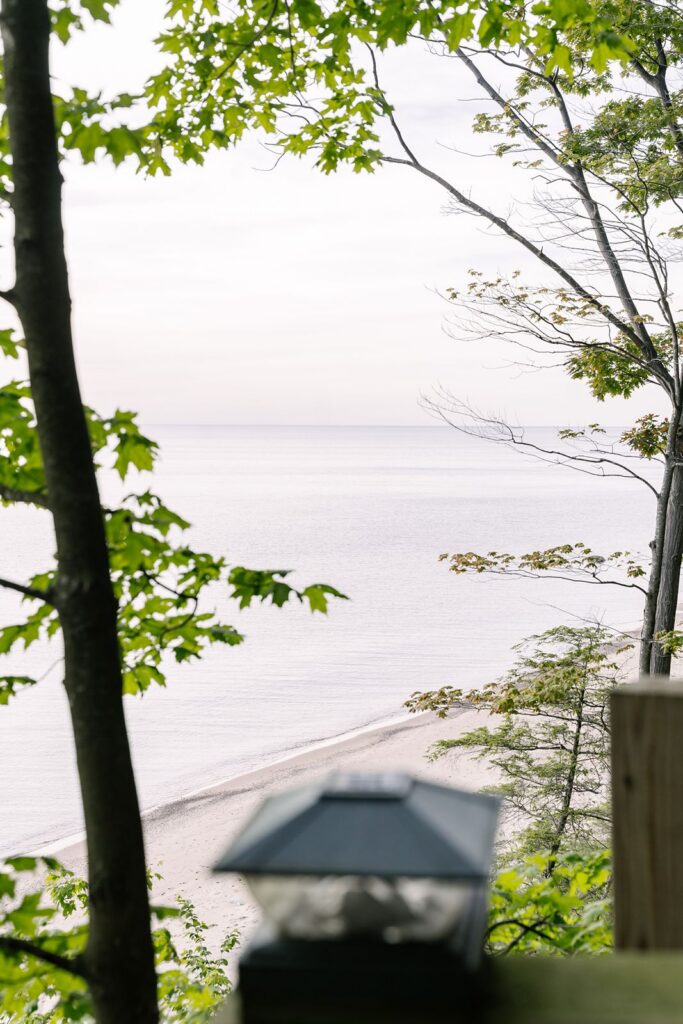 view of beach from the yard at Lake michigan elopement venue rental lake house saugatuck
